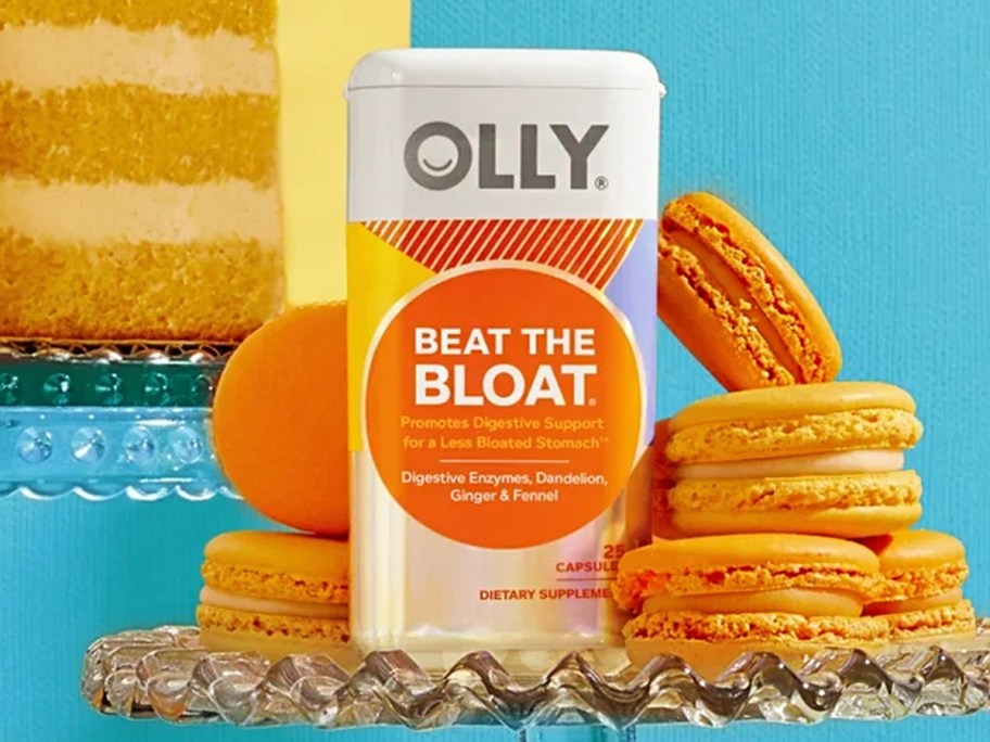 olly beat the bloat bottle next to macarons