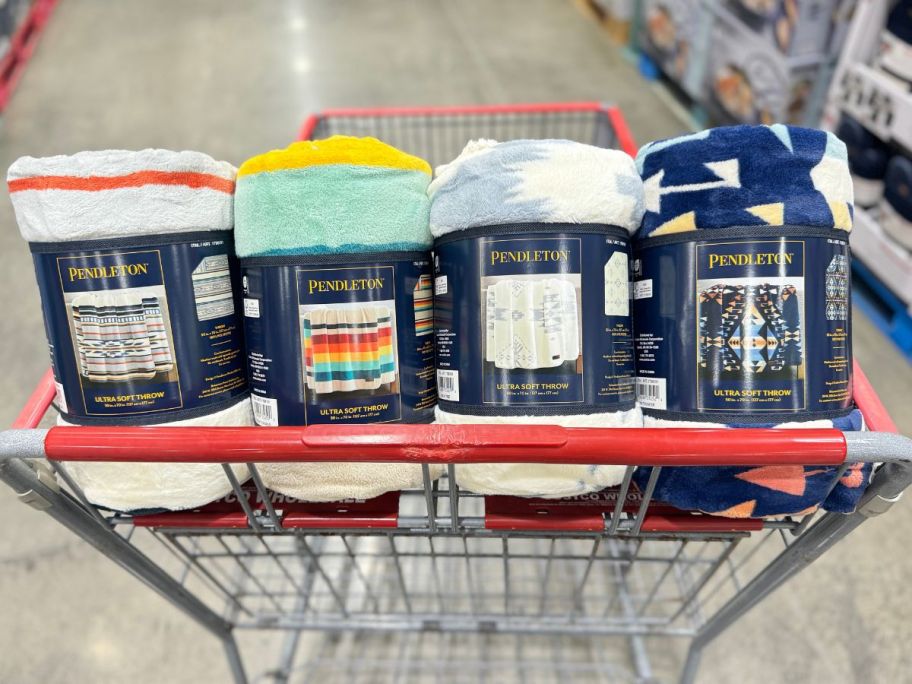 four ultra soft throws in a costco cart