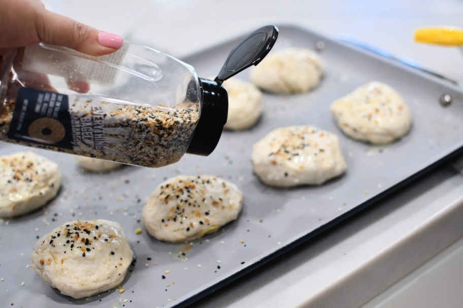 topping breakfast bombs with everything bagel seasoning 