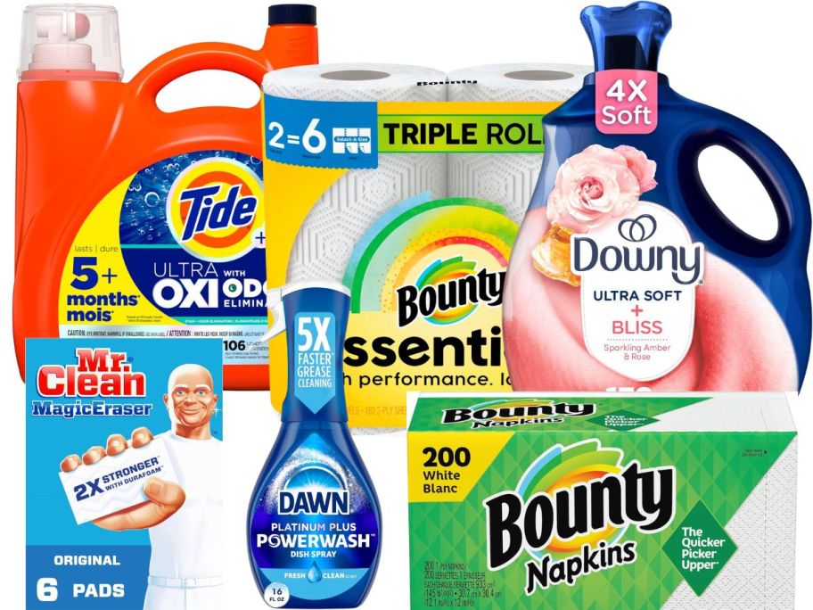 large Tide detergent bottle, pack of Bounty Paper Towels, and Downy Fabric softener bottle with a box of Mr Clean Magic Erasers, Dawn Powerwash, Bounty Napkins in front of them