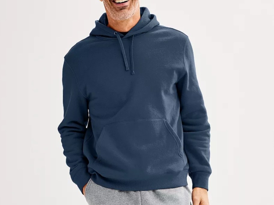 man wearing navy blue hoodie