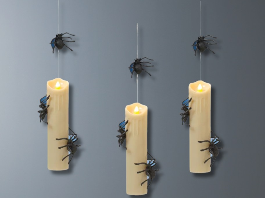 LED hanging candles with spiders Halloween decor