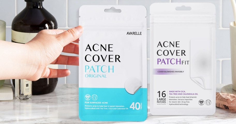 hand reaching for pack of Avarelle Acne Cover Patches