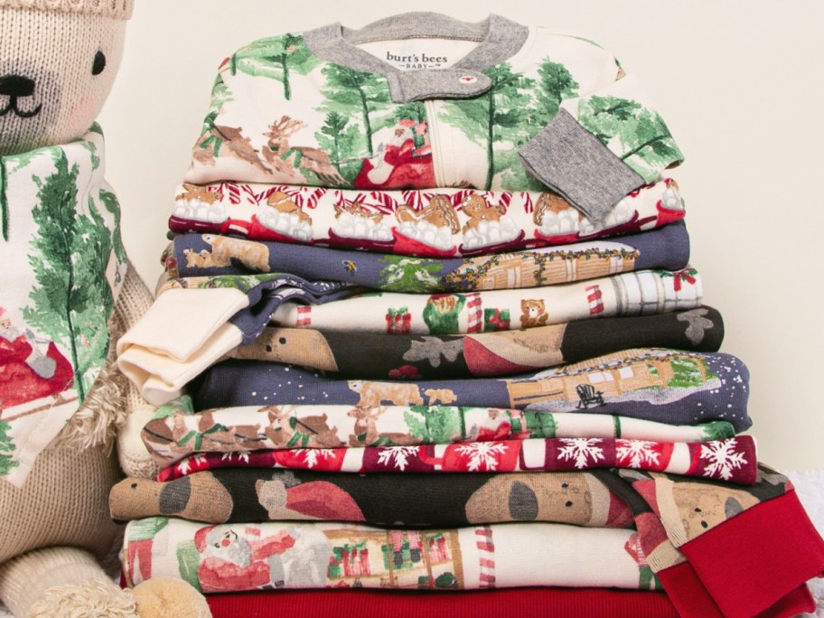 stack of holiday themed burts bees pajamas