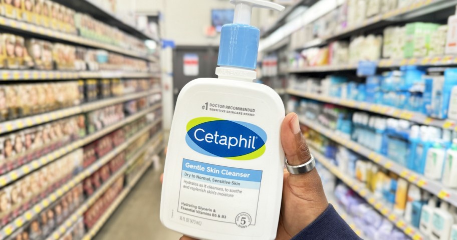 hand holding a bottle of Cetaphil Gentle Skin Cleanser in store