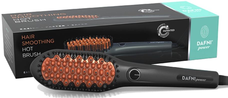 a orange and black power styling brush shown with packaging on a white background