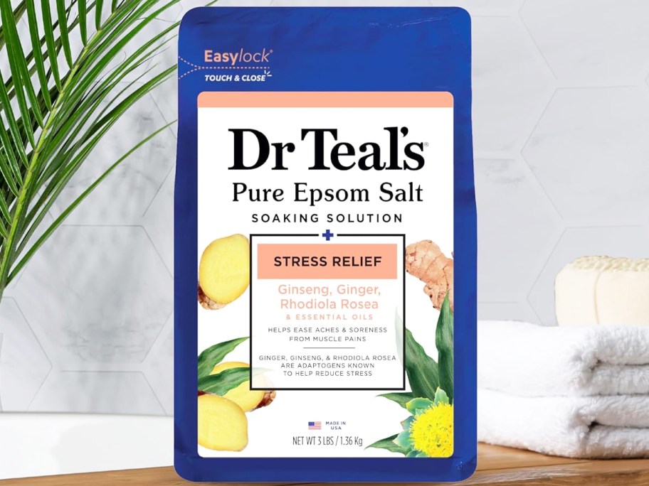 bag of Dr Teal's  Stress Relief Pure Epsom Salt near bathtub 