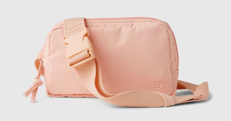 A pink GAP belt bag