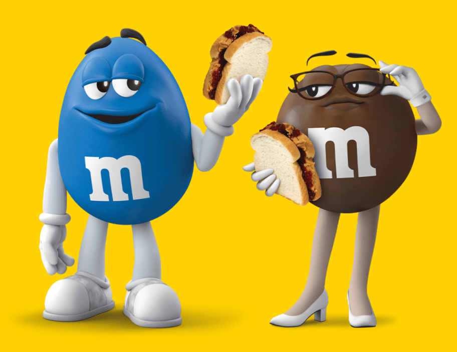 M and Ms holding up Peanut butter and jelly sandwiches