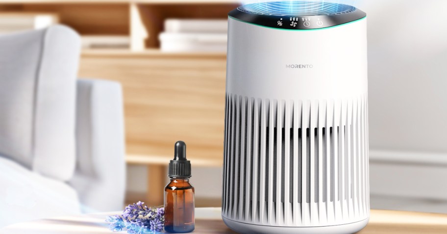 white morento air purifier sitting on coffee table