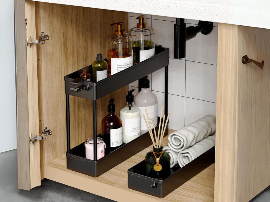 Spacekeeper 3-Tier Slim Rolling Storage Cart disassembled under the sink