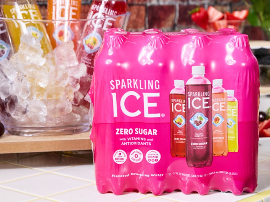 pink Sparkling Ice 12-Count Variety Pack on counter in front of bottles on ice in bowl