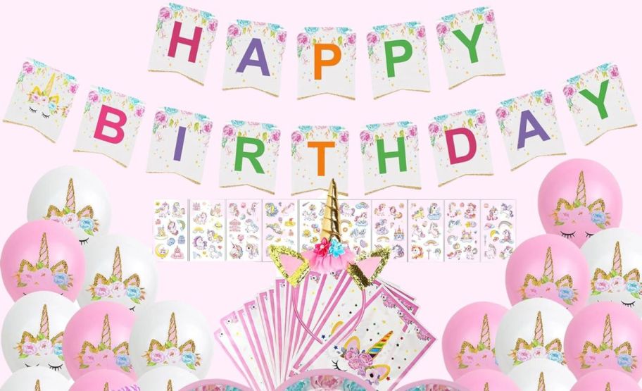unicorn themed party decor kit including cups, place and decorations