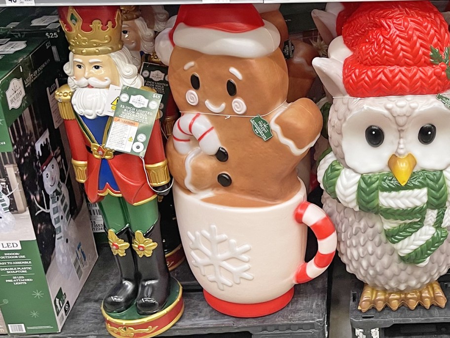 nutcracker and gingerbread man christmas blow molds on store shelf