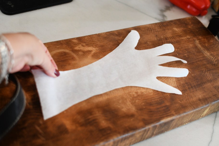 adding arm and hand outline to wood board