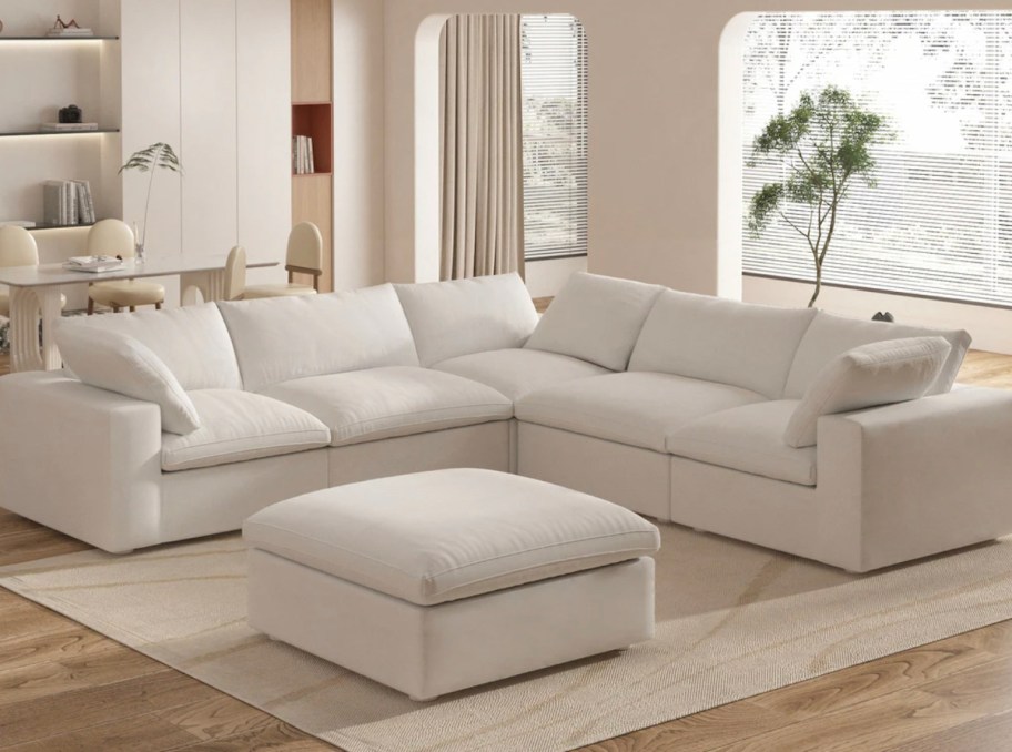 stock photo of beige sectional cloud couch lookalike in living room