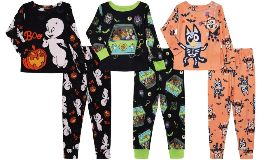 3 sets of toddler snug fit pajamas in various halloween prints