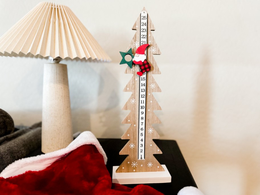 gnome advent calendar next to lamp
