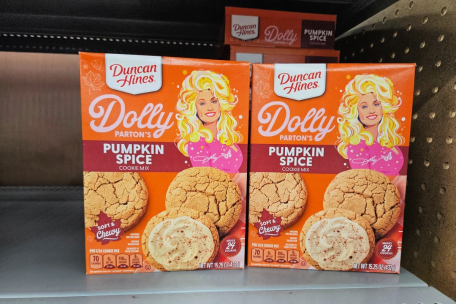 boxes of duncain hines dolly parton pumpkin spice cookies on a walmart store shelf