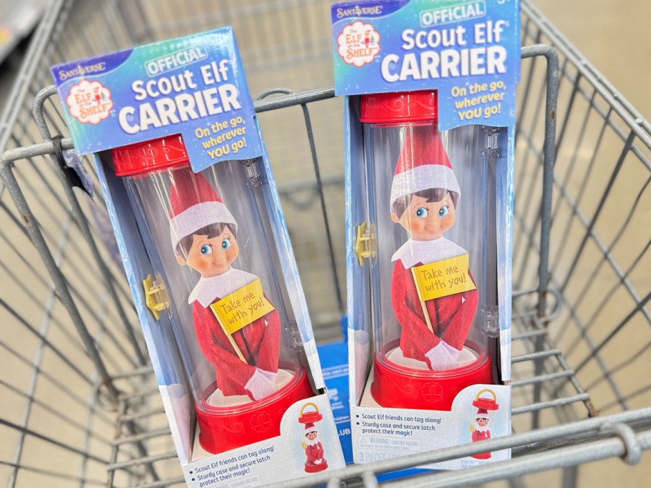 two elf on the shelf carriers in shopping cart 