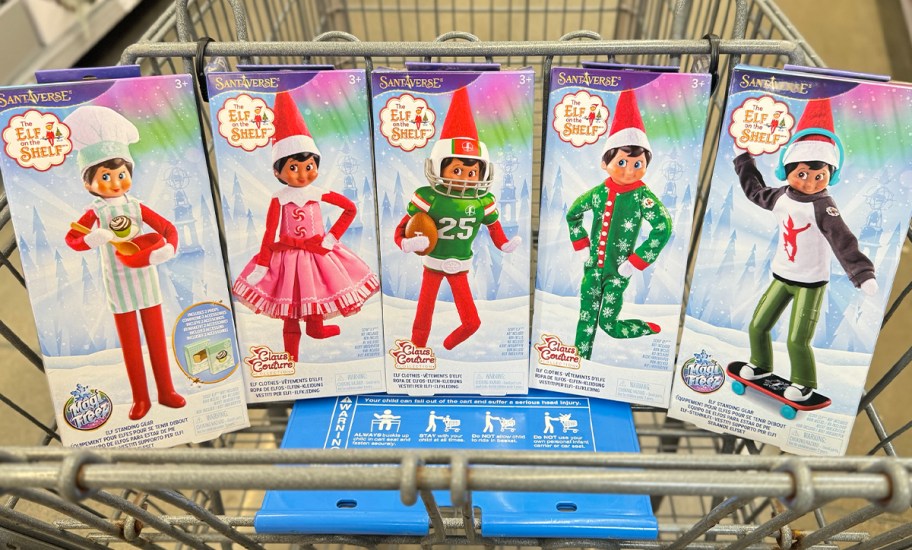 5 elf on the shelf outfit boxes in walmart shopping cart