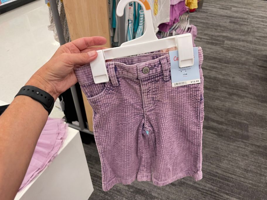 purple Cat & Jack Pants in hand in store