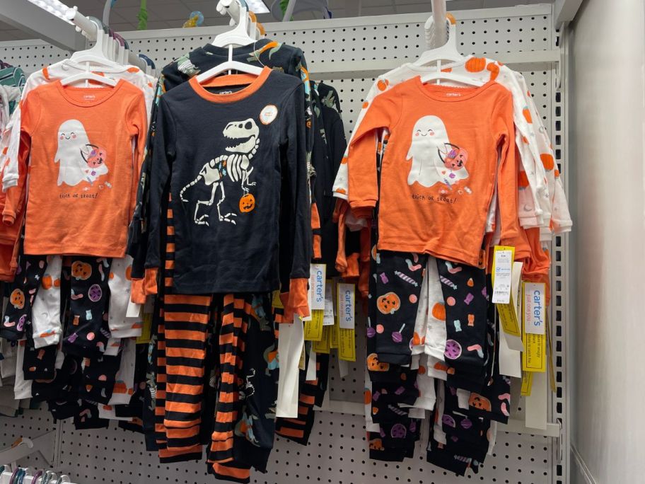 carters halloween pajamas hanging in store