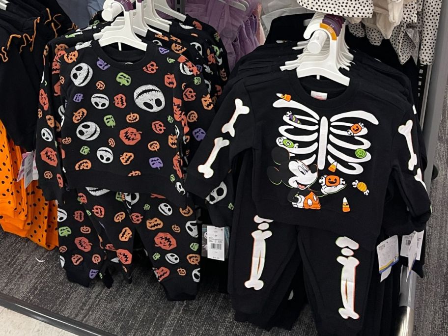 nightmare before christmas and skeleton pajamas hanging in store