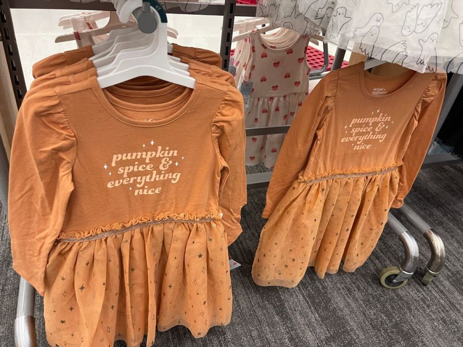 Cat & Jack Toddler Girls Long-Sleeve Halloween Pumpkin Spice Tulle Dresses hanging in store