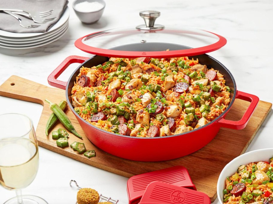 red cast iron pan with food in it