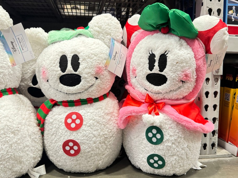 fuzzy mickey and minnie door greeters in store 