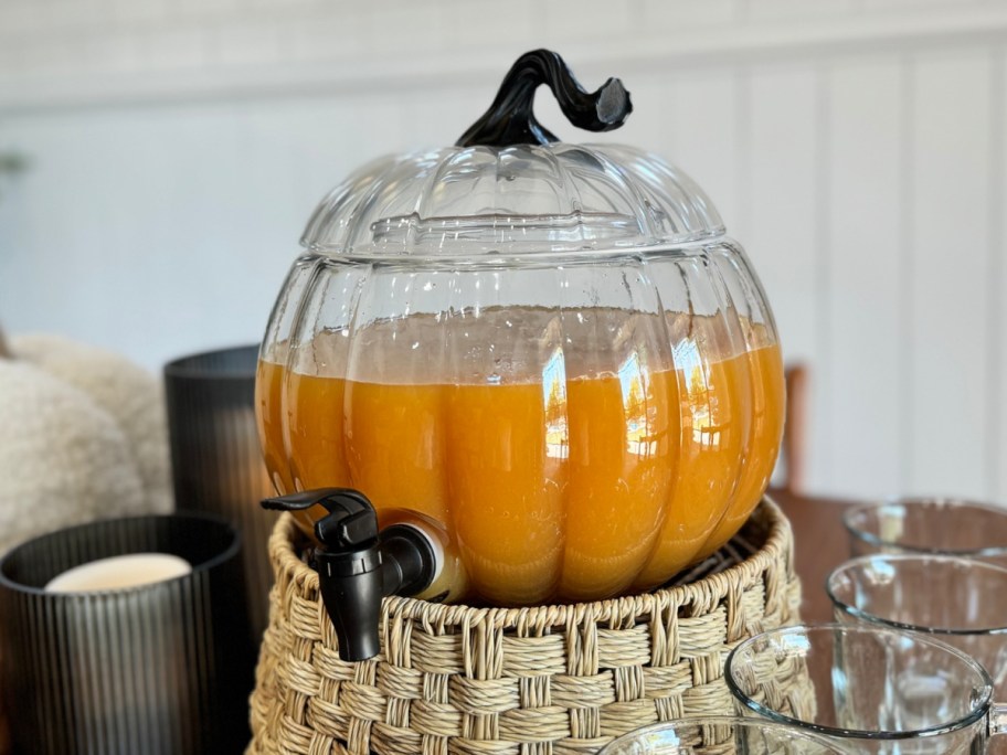 pumpkin dispensary with juice inside of it