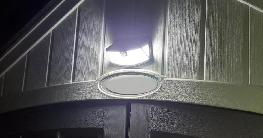 solar light illuminating a work shed at night