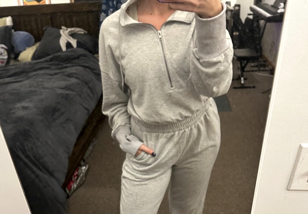 woman wearing hooded jogger jumpsuit 