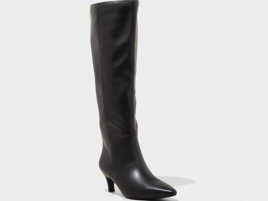 tall black leather boots stock image