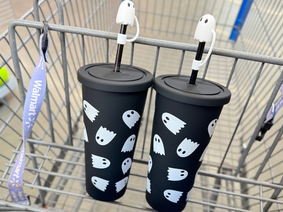 black and white ghost tumbler with straw in walmart shopping cart 