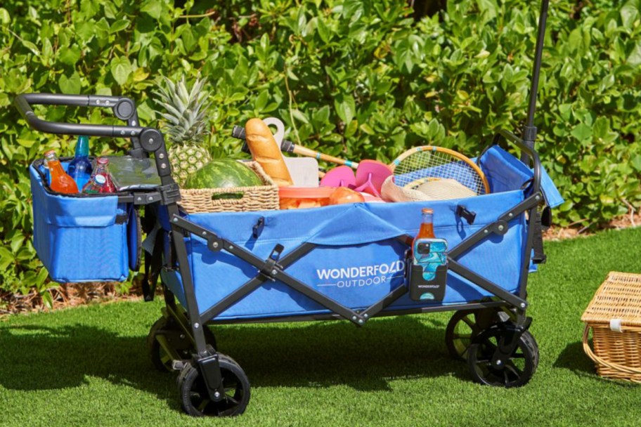 blue wagon filled with items outside