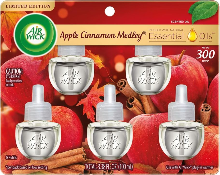 Air Wick Plug in Scented Oil Refill 5 Count Apple Cinnamon Medley stock image 