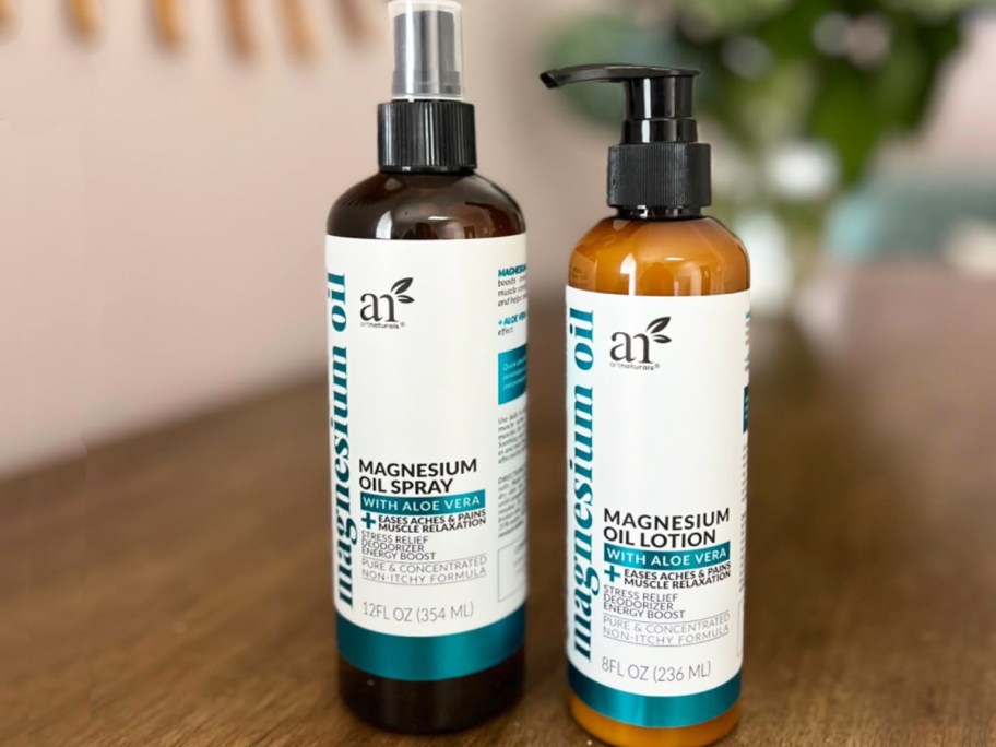 ArtNaturals Magnesium Oil spray and lotion bottles on table