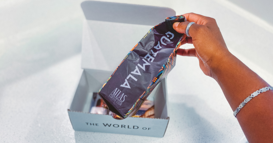 Atlas Coffee Bag being held by a woman