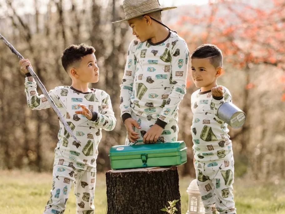 3 Boys wearing Burts Bees GOne Fishing pajamas