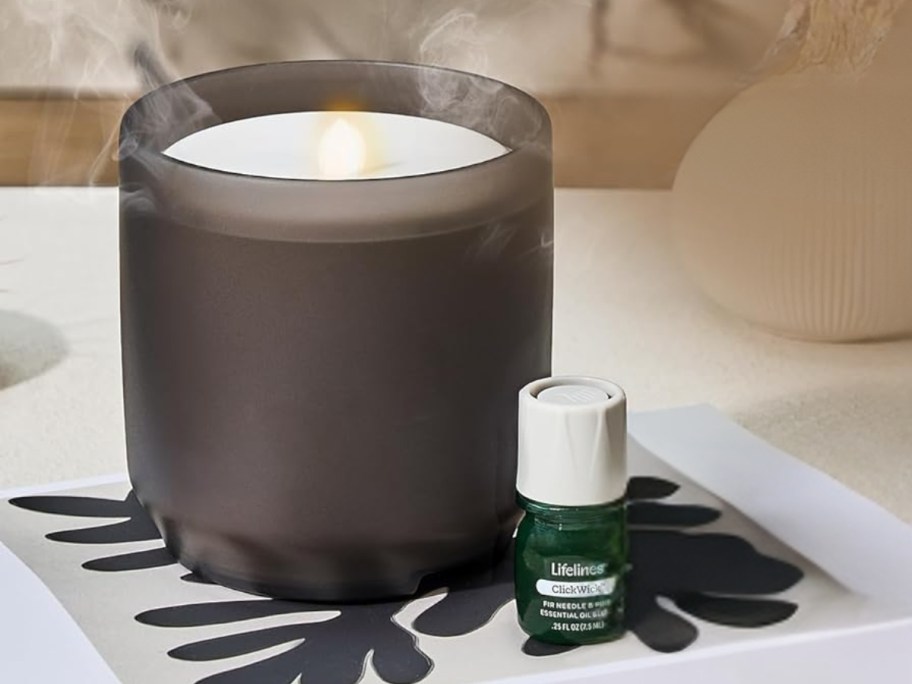 a flameless candle essential oil diffusers on a desk