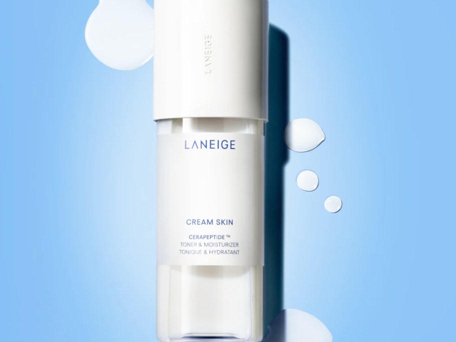 white bottle of Laneige Cream Skin Toner & Moisturizer on a blue background