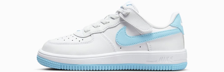 white and light blue nike sneaker