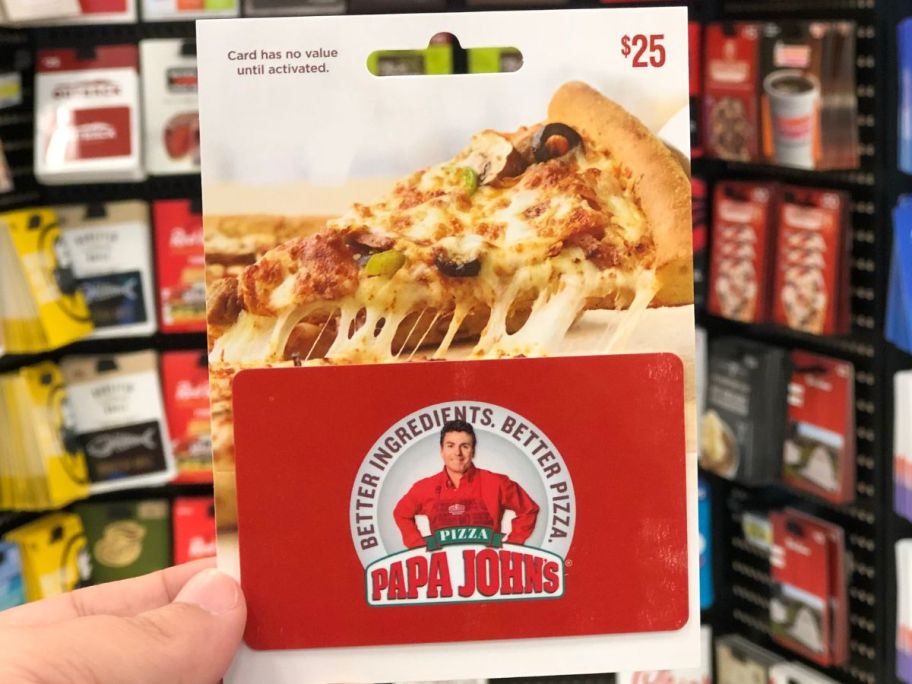 Hand holding a Papa John's $25 Gift Card