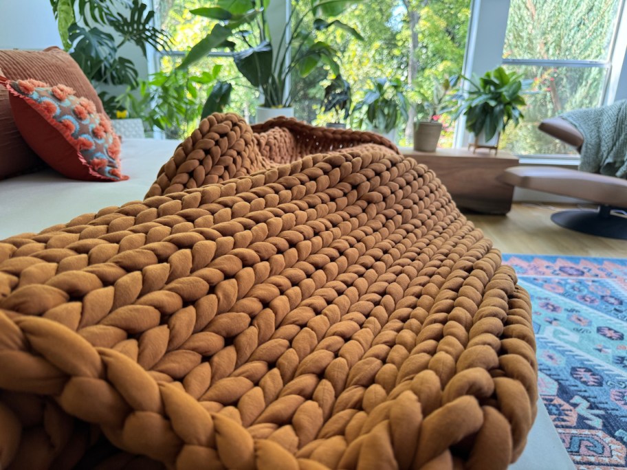 close up of brown chunky knit blanket