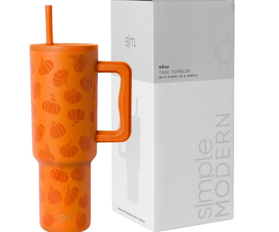 An orange Simple Modern Pumpkin tumbler w/ a white box