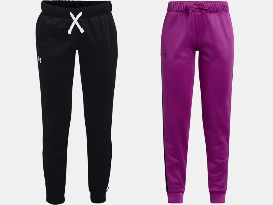 black and purple pairs of under armour joggers