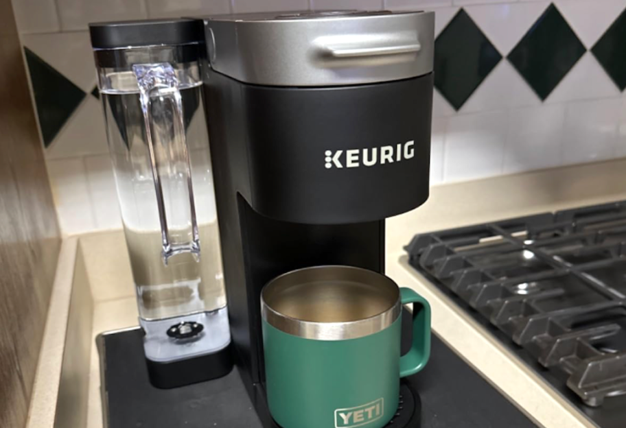 Black Keurig on kitchen counter 