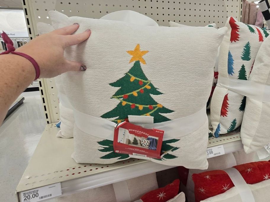 christmas tree holiday throw pillow on a store shelf
